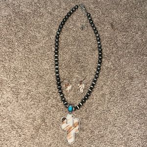 Cowhide Navajo pearl earrings and necklace